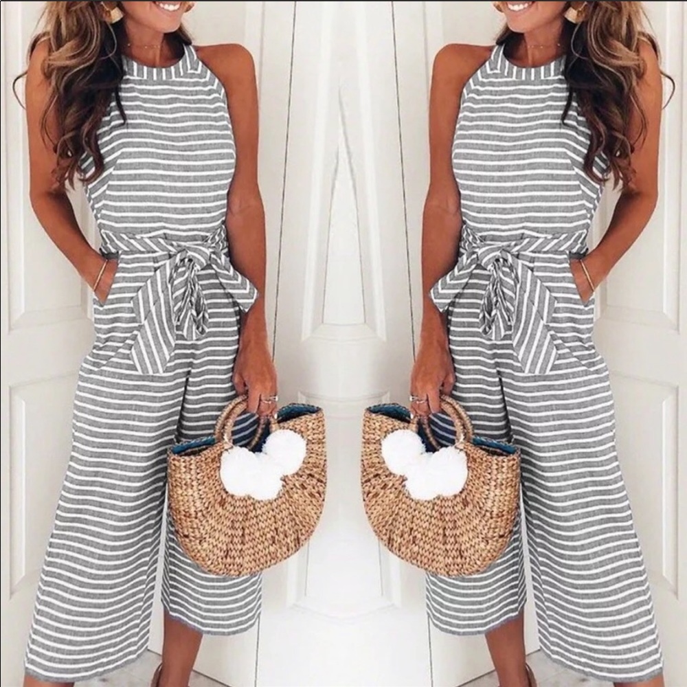 NWOT Never worn. Gray and white striped  romper.